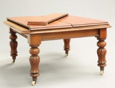 A VICTORIAN MAHOGANY EXTENDING DINING TABLE, the moulded top with rounded corners, raised on