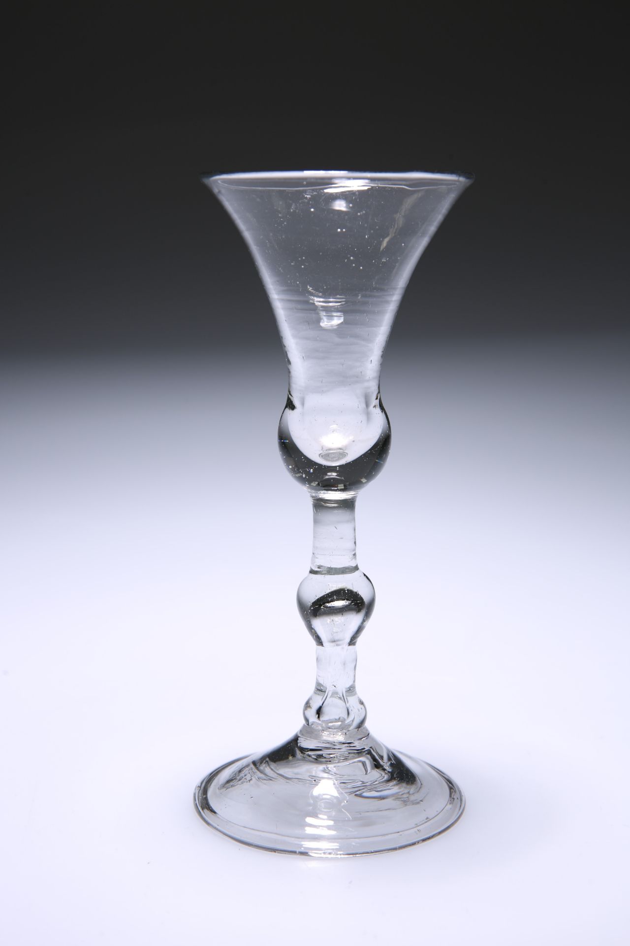 A LIGHT BALUSTER WINE GLASS