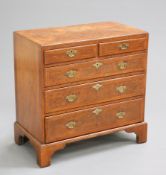 AN EARLY 18TH CENTURY WALNUT CHEST OF DRAWERS
