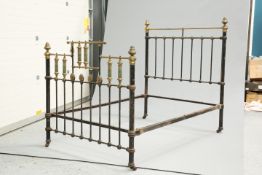 A VICTORIAN BRASS AND CAST IRON BED