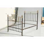 A VICTORIAN BRASS AND CAST IRON BED