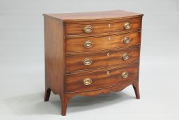 A GEORGE III MAHOGANY BOW-FRONT CHEST OF DRAWERS, with four long graduated drawers, each fitted with