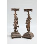 A PAIR OF CONTINENTAL CARVED FIGURAL STANDS, 19TH CENTURY,