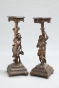 A PAIR OF CONTINENTAL CARVED FIGURAL STANDS, 19TH CENTURY,