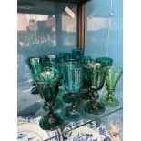 A COLLECTION OF TWENTY VICTORIAN GREEN GLASS WINES. (20)