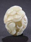 A CHINESE CELADON JADE CARVING