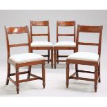 A SET OF FOUR REGENCY MAHOGANY DINING CHAIRS