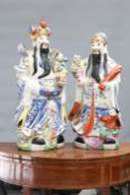 A LARGE PAIR OF CHINESE PORCELAIN FIGURES