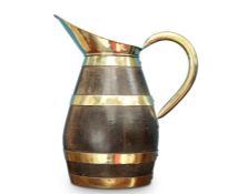 A BRASS AND COOPERED OAK PITCHER, of ovoid form. 50.5cm high