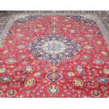 A KASHAN CARPET. 410cm by 305cm