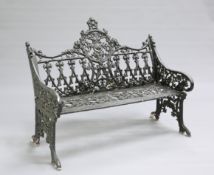 A VICTORIAN COALBROOKDALE STYLE CAST IRON GARDEN BENCH