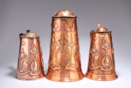 THREE ARTS AND CRAFTS COPPER EWERS