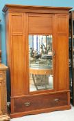 A LATE VICTORIAN MAHOGANY MIRROR-DOOR WARDROBE