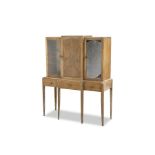 A COTSWOLD SCHOOL WALNUT VITRINE