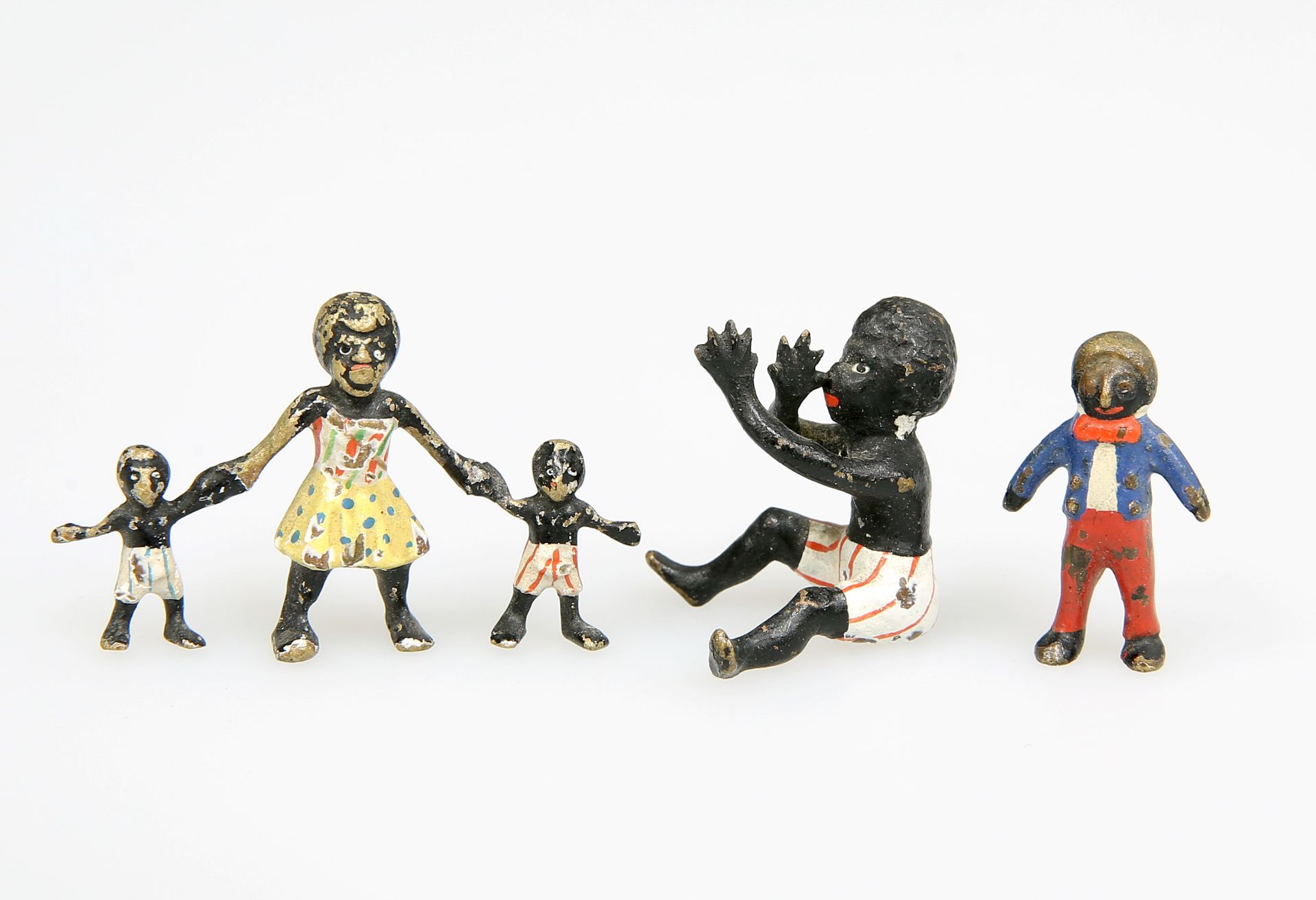 THREE EARLY 20TH CENTURY COLD PAINTED BRONZE FIGURES OF BLACK AMERICANA