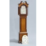 A GEORGE III OAK AND MAHOGANY LONGCASE CLOCK