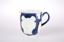 A WORCESTER BLUE AND WHITE COFFEE CUP, CIRCA 1760