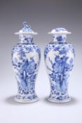 A PAIR OF CHINESE BLUE AND WHITE PORCELAIN VASES AND COVERS