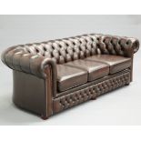 A PAIR OF BROWN LEATHER CHESTERFIELD THREE-SEATER SOFAS