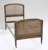 A PAIR OF HARROD'S OAK AND CANEWORK BEDS