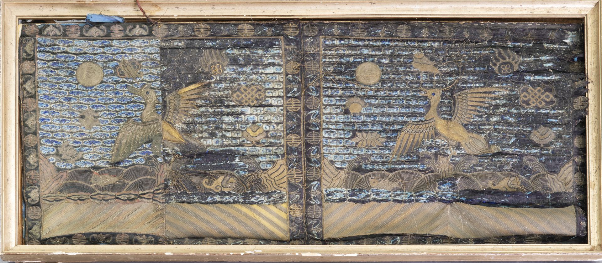 AN OLD CHINESE SILK PANEL, worked with gold thread