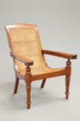 AN INDONESIAN TEAK AND BERGERE CANED PLANTER'S CHAIR