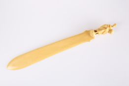 AN IVORY PAGE TURNER OR LARGE PAPER KNIFE