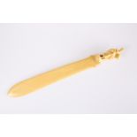 AN IVORY PAGE TURNER OR LARGE PAPER KNIFE