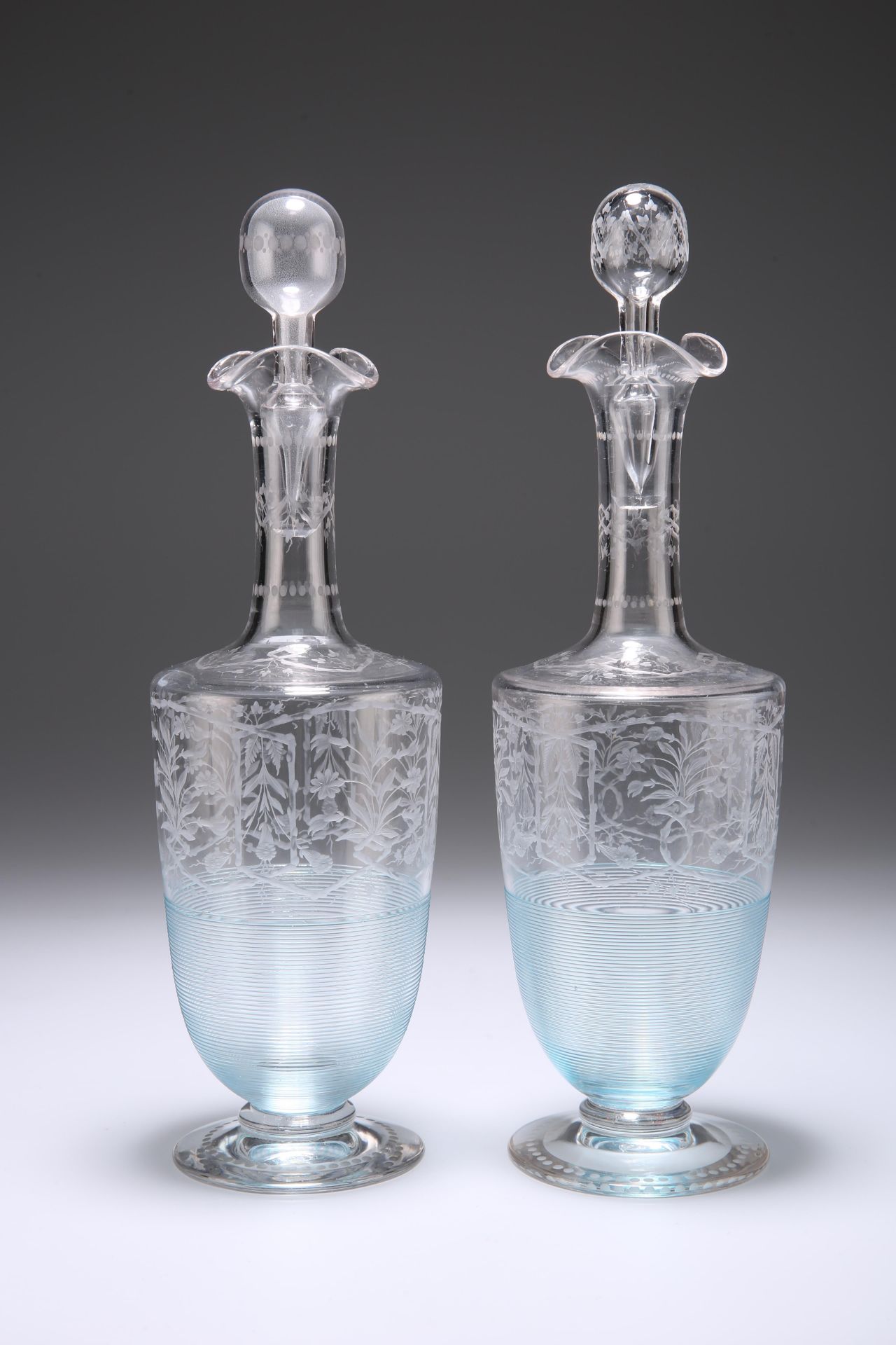 A MATCHED PAIR OF LATE 19TH CENTURY STOURBRIDGE ENGRAVED DECANTERS