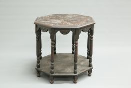 A VICTORIAN CARVED OAK CENTRE TABLE