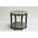 A VICTORIAN CARVED OAK CENTRE TABLE