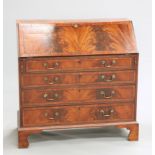 A GEORGE III MAHOGANY SLANT-FRONT BUREAU