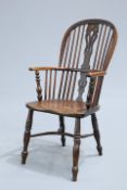 AN EARLY 19TH CENTURY YEW AND ELM WINDSOR CHAIR