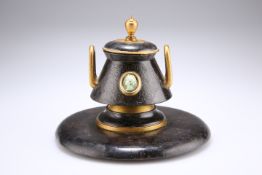 A REGENCY PATINATED AND GILDED BRONZE INKWELL