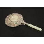 A CHINESE WHITE-METAL AND JADE HAND MIRROR