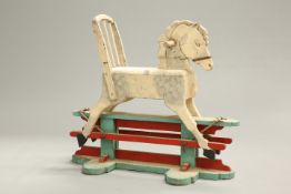 AN EDWARDIAN PAINTED WOODEN ROCKING HORSE