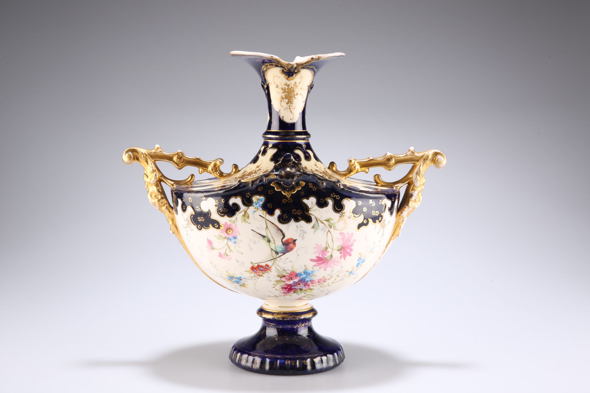 A ROYAL BONN TWO-HANDLED VASE