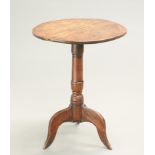 AN 18TH CENTURY OAK AND ELM TRIPOD TABLE