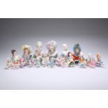 A COLLECTION OF TWENTY CONTINENTAL PORCELAIN PIN-CUSHION DOLLS.