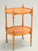 A REGENCY STYLE YEW WOOD DROP-END OCCASIONAL TABLE