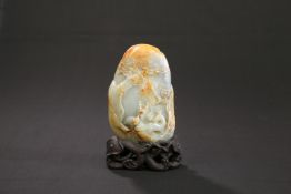 A CHINESE PALE CELADON JADE BOULDER CARVING
