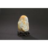 A CHINESE PALE CELADON JADE BOULDER CARVING