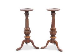 A PAIR OF VICTORIAN MAHOGANY TORCHERES