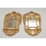 A HANDSOME PAIR OF BAROQUE REVIVAL GILTWOOD MIRRORS