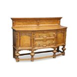 A LATE VICTORIAN OAK AND POLLARD OAK SIDEBOARD