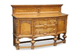 A LATE VICTORIAN OAK AND POLLARD OAK SIDEBOARD