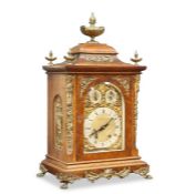 A LARGE BRASS-MOUNTED OAK BRACKET CLOCK