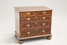 A WILLIAM AND MARY OYSTER VENEERED CHEST OF DRAWERS