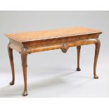 A GEORGE II STYLE WALNUT SERVING TABLE