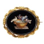 AN EARLY VICTORIAN MICRO MOSAIC MEMORIAL BROOCH